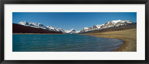 Framed Lake with snow covered mountains in the background, Sherburne Lake, US Glacier National Park, Montana, USA Print