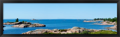 Framed Rock formations in a lake, Killarney, Georgian Bay, Ontario, Canada Print