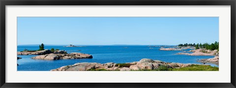 Framed Rock formations in a lake, Killarney, Georgian Bay, Ontario, Canada Print