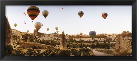 Framed Hot air balloons over landscape at sunrise, Cappadocia, Central Anatolia Region, Turkey Print