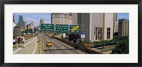 Framed Suspension bridge with buildings in a city, Brooklyn Bridge, New York City, New York State, USA Print