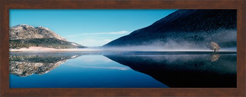 Framed Reflection of a mountain with snowy trees on a lake in winter afternoon, Cote d&#39;Azur, France Print