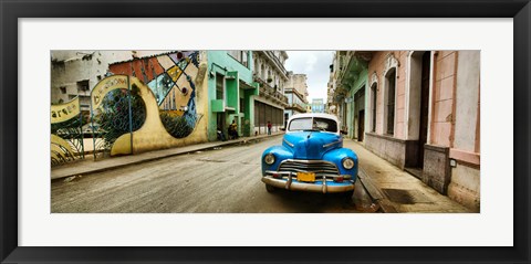 Framed Old car and a mural on a street, Havana, Cuba Print