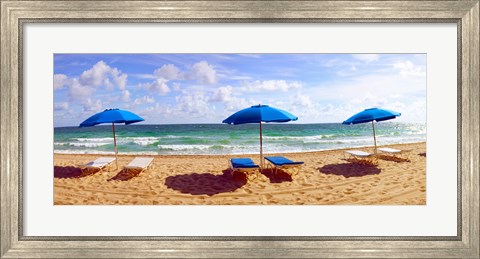 Framed Lounge chairs and beach umbrellas on the beach, Fort Lauderdale Beach, Florida, USA Print