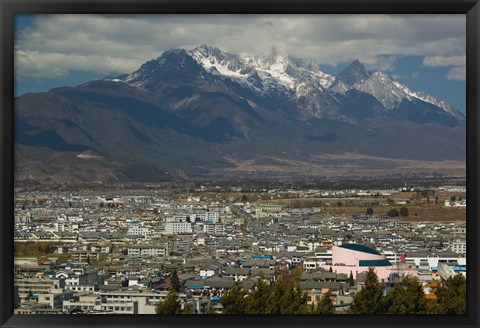 Framed High angle view of buildings in the new town towards Jade Dragon Snow Mountain, Lijiang, Yunnan Province, China Print