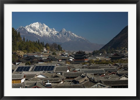 Framed High angle view of houses with Jade Dragon Snow Mountain in the background, Old Town, Lijiang, Yunnan Province, China Print