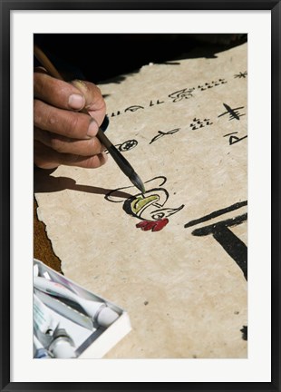 Framed Chinese calligrapher painting calligraphy on a paper at the Dongba Place, Old Town, Lijiang, Yunnan Province, China Print