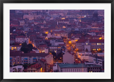 Framed Aerial view of building lit up at dusk viewed from Parc de Montjuzet, Clermont-Ferrand, Auvergne, Puy-de-Dome, France Print