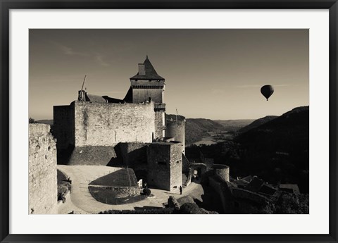 Framed Chateau de Castelnaud with hot air balloon flying over a valley, Castelnaud-la-Chapelle, Dordogne, Aquitaine, France Print