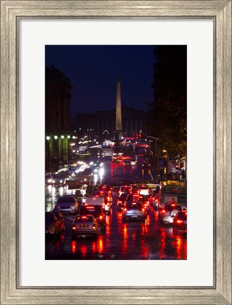 Framed Elevated view of traffic on the road at night viewed from Eglise Madeleine church, Rue Royale, Paris, Ile-de-France, France Print