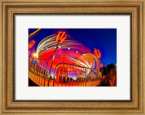 Framed Time exposure of a Carnival ride at night Print