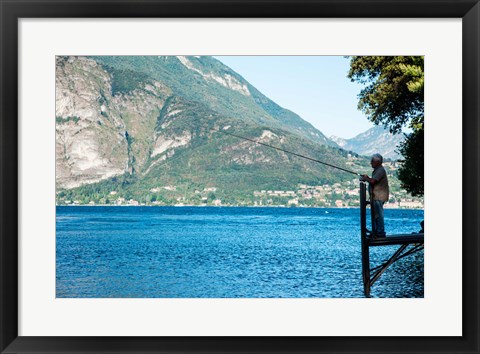 Framed Man Fishing from Dock on Edge of Lake Como, Varenna, Lombardy, Italy Print