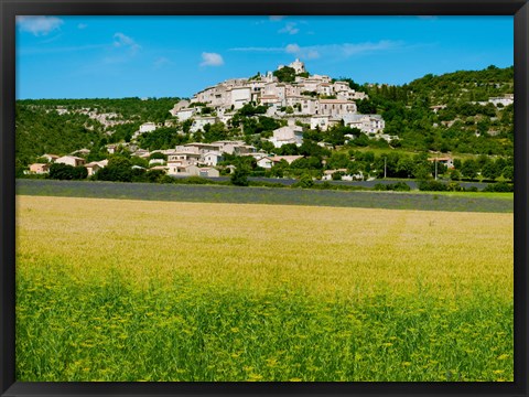 Framed Farm with a town in the background, Simiane-La-Rotonde, Alpes-de-Haute-Provence, Provence-Alpes-Cote d&#39;Azur, France Print