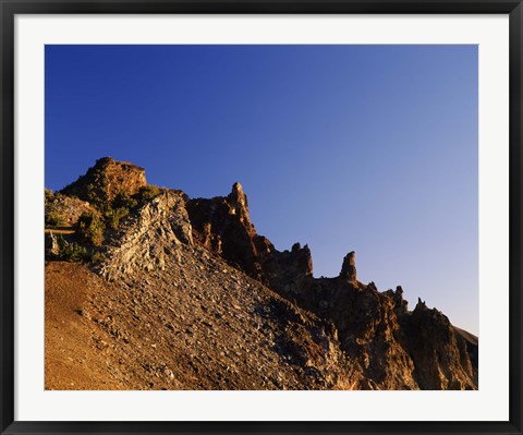 Framed Hillman Peak crags at sunrise, Crater Lake National Park, Oregon, USA Print