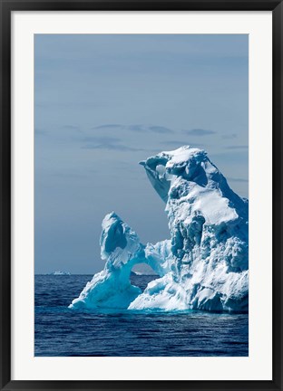 Framed arched iceberg floating in Gerlache Strait, Antarctica. Print