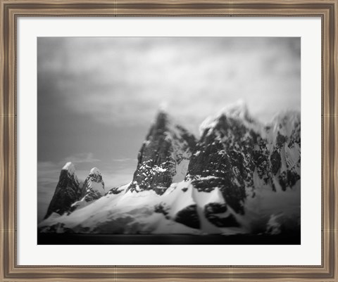 Framed Antarctica, Mountain peaks along Cape Renaud in Lemaire Channel. Print