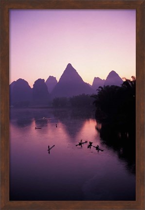 Framed Fishing rafts on Li River, dawn, Guangxi Province, China Print