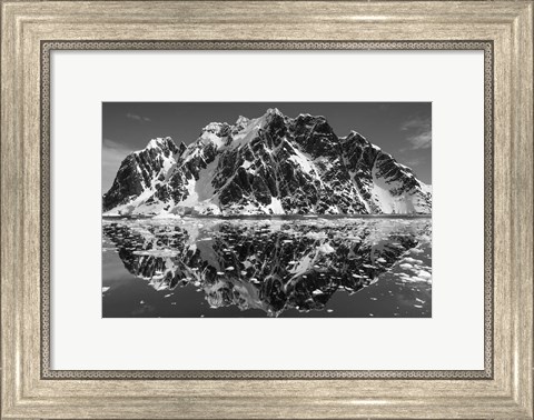 Framed Antarctica, Mountain peaks reflected in the Lemaire Channel. Print