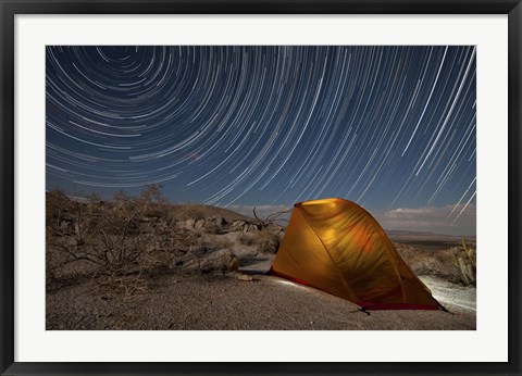 Framed Star trails above a campsite in Anza Borrego Desert State Park, California Print