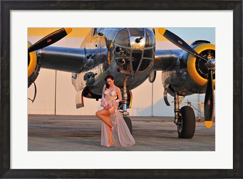 Framed Sexy 1940&#39;s pin-up girl in lingerie posing with a B-25 bomber Print