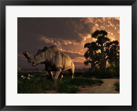 Framed Megacerops grazing a prehistoric landscape Print