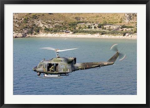 Framed Italian Air Force AB-212 ICO helicopter in flight over Italy Print