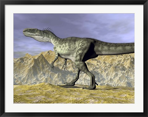 Framed Monolophosaurus dinosaur walking on rocky terrain near mountain Print