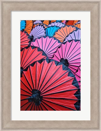 Framed Pattern of newly assembled decorative umbrellas drying in sun, Umbrella Making Center, Bo Sang, near Chiang Mai, Thailand. Print