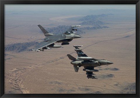 Framed Two F-16&#39;s on a training mission over the Arizona desert Print