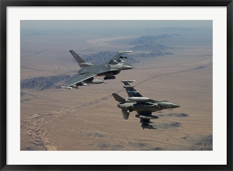 Framed Two F-16&#39;s on a training mission over the Arizona desert Print