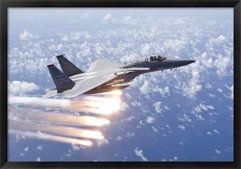 Framed F-15 Eagle Releases Flares over the Pacific Ocean Print