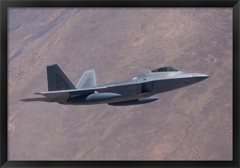 Framed F-22 Raptor on a Training Mission Print