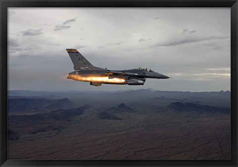 Framed F-16 Fighting Falcon Fires an AGM-65 Maverick Missile Print