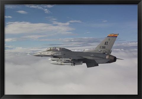 Framed F-16 Fighting Falcon Flies with AGM-65 Maverick Missile Print