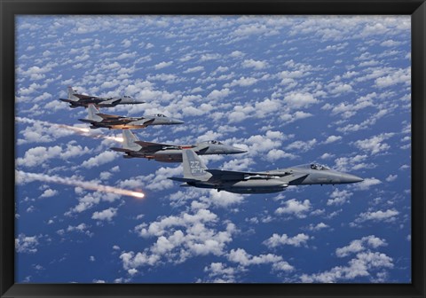 Framed Four F-15 Eagles fly in Formation Over the Pacific Ocean Print