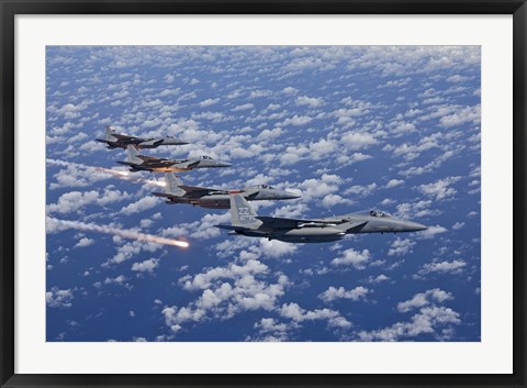 Framed Four F-15 Eagles fly in Formation Over the Pacific Ocean Print