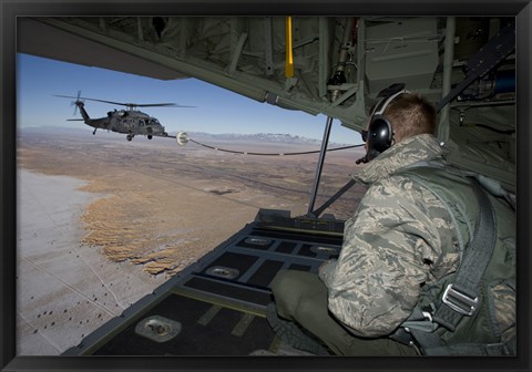 Framed Loadmaster on an HC-130 Watches a HH-60G Pave Hawk Refuel Print