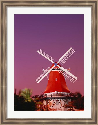 Framed Mill Resort against pink sky, Oranjestad, Aruba Print