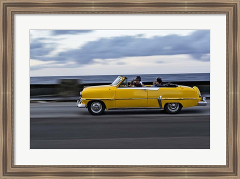 Framed 1950&#39;s era car in motion along the Malecon or seawall, Havana, Cuba Print