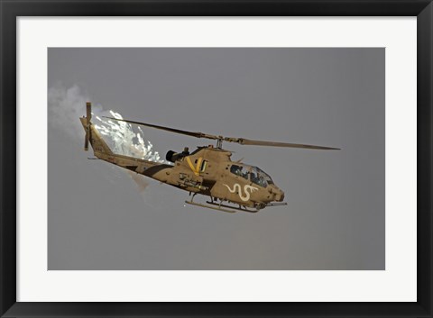 Framed AH-1S Tzefa of the Israeli Air Force dispenses flares Print