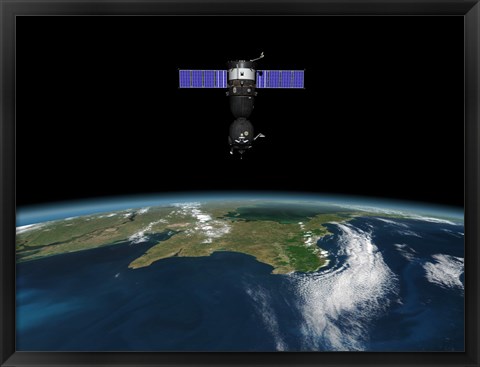 Framed Soyuz TMA-M spacecraft in low Earth orbit Print