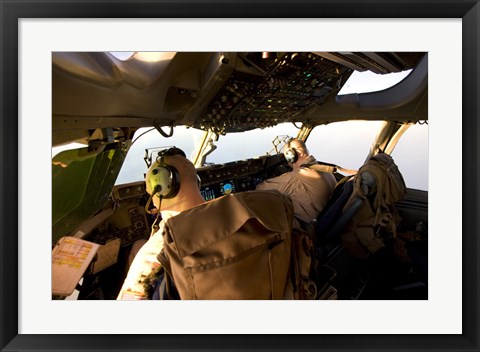 Framed US Army Pilots in-Flight in the Cockpit of a C-17 Globemaster III during a Mission to Qatar Print