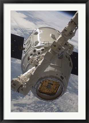 Framed SpaceX Dragon Commercial Cargo Craft during Grappling Operations with Canadarm2 Print