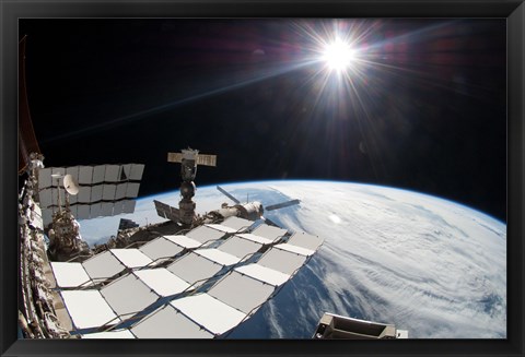 Framed Bright Sun, a Portion of the International Space Station and Earth&#39;s horizon Print