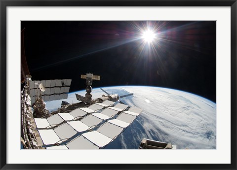 Framed Bright Sun, a Portion of the International Space Station and Earth&#39;s horizon Print