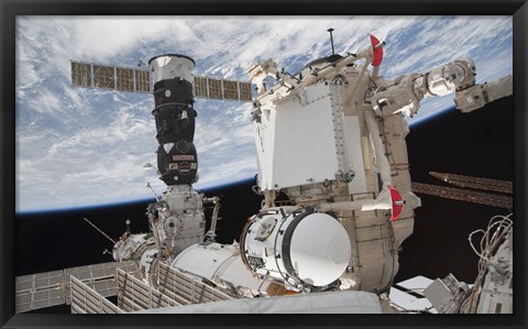 Framed Mini Research Module 1 attached to the International Space Station Print