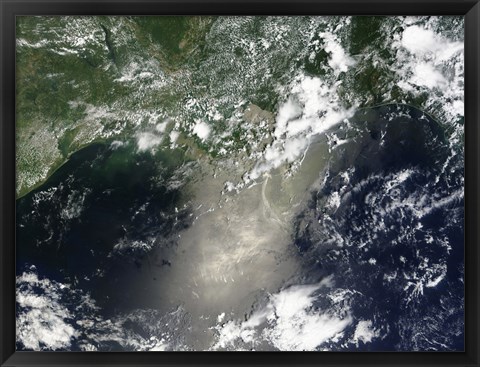 Framed Satellite view of Streaks and Ribbons of Oil Brighten the Reflection of the Sun off the Gulf of Mexico Print