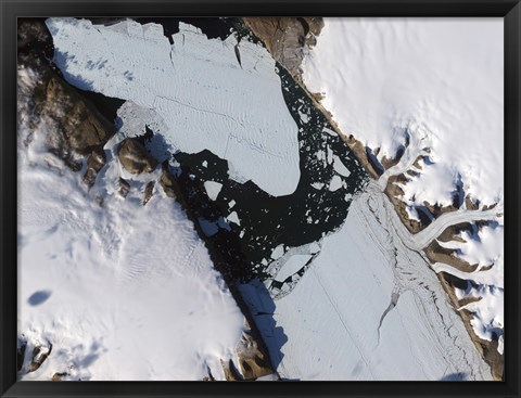 Framed Ice Island that Calved off the Petermann Glacier in Northwestern Greenland Migrates Down the fjord Print