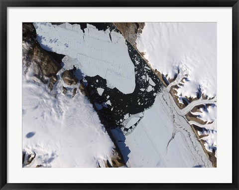 Framed Ice Island that Calved off the Petermann Glacier in Northwestern Greenland Migrates Down the fjord Print