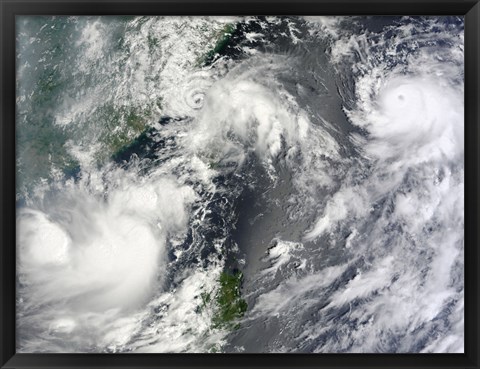 Framed Three Strong Storms Churn in the Pacific Ocean Basin off the Asian coast Print